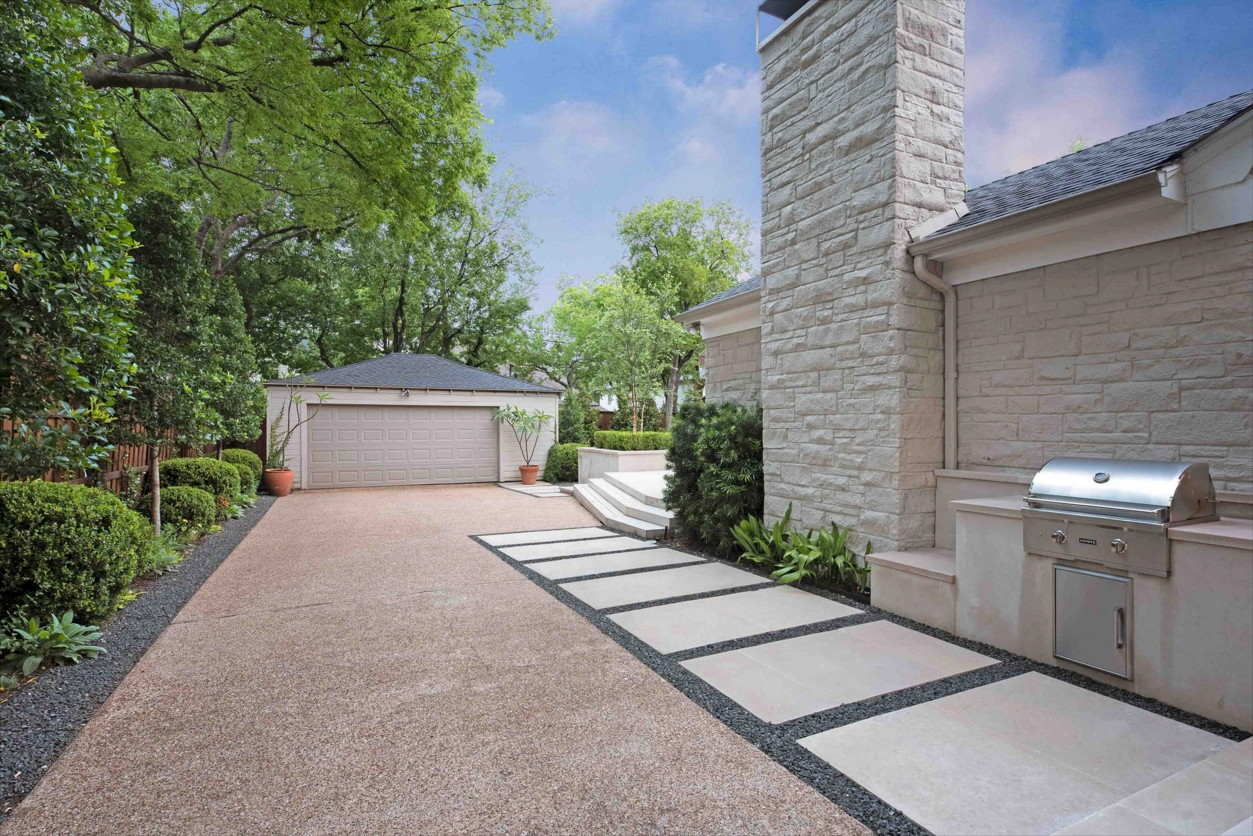 Water-managed residential landscape with proper grading and plant selection in Northeast Atlanta