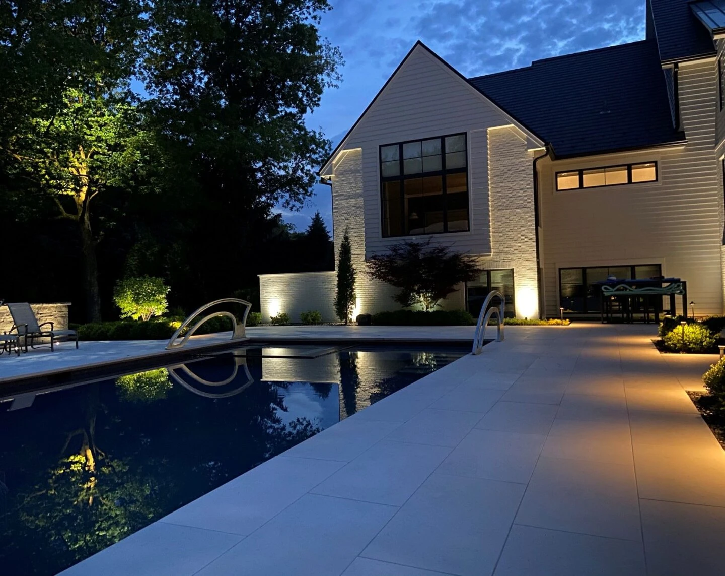 Complete pool deck renovation in Northeast Atlanta with integrated landscape