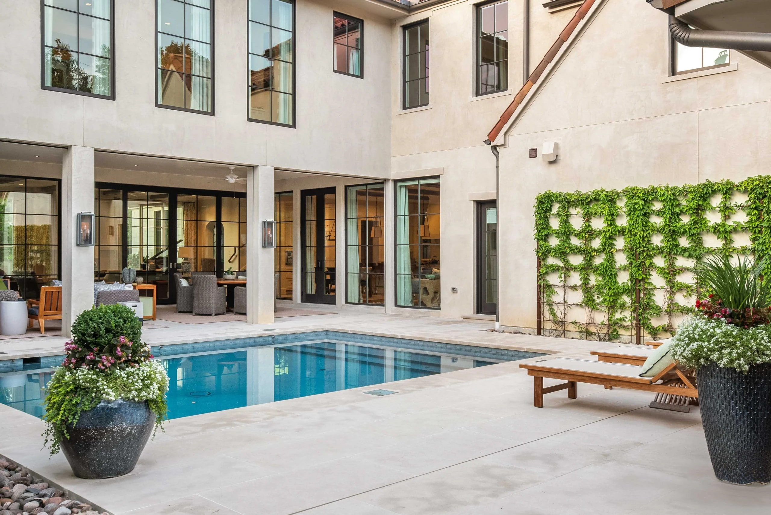 Pool deck with proper drainage design in Woodstock GA by Timberstone Landscape