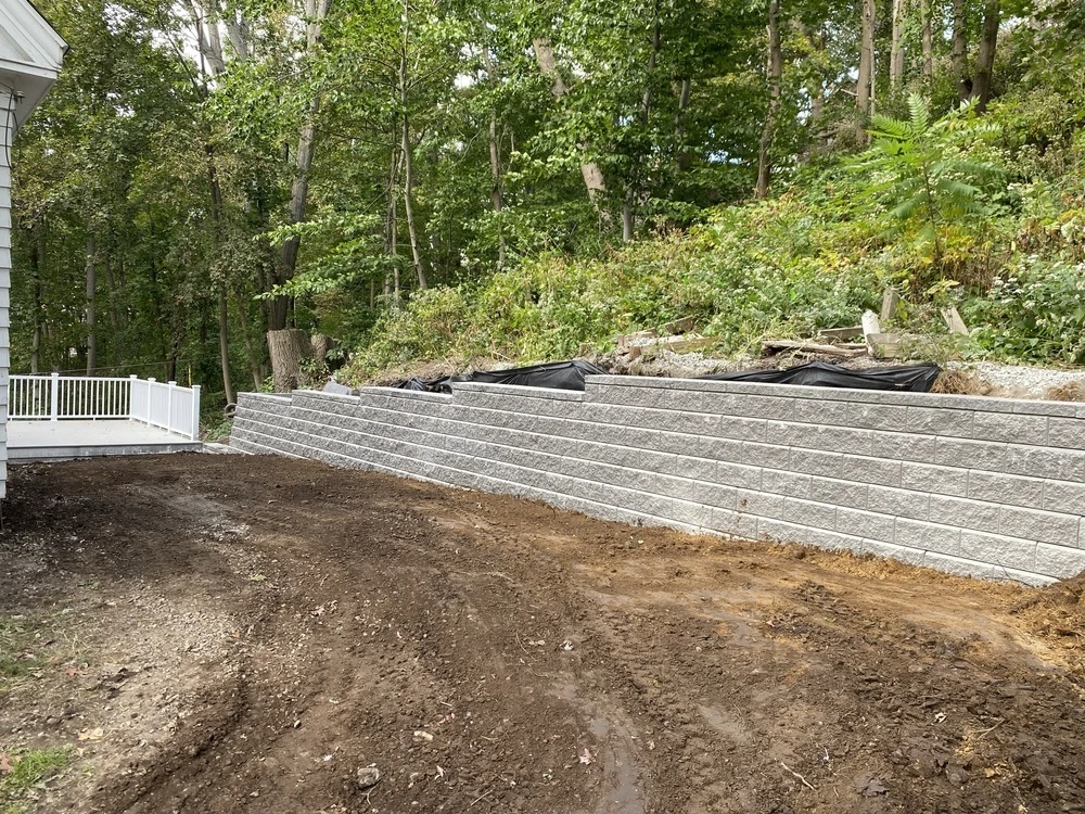 Why Woodstock, GA Retaining Walls Need More Than a Stack of Blocks — What a Structural System Looks Like